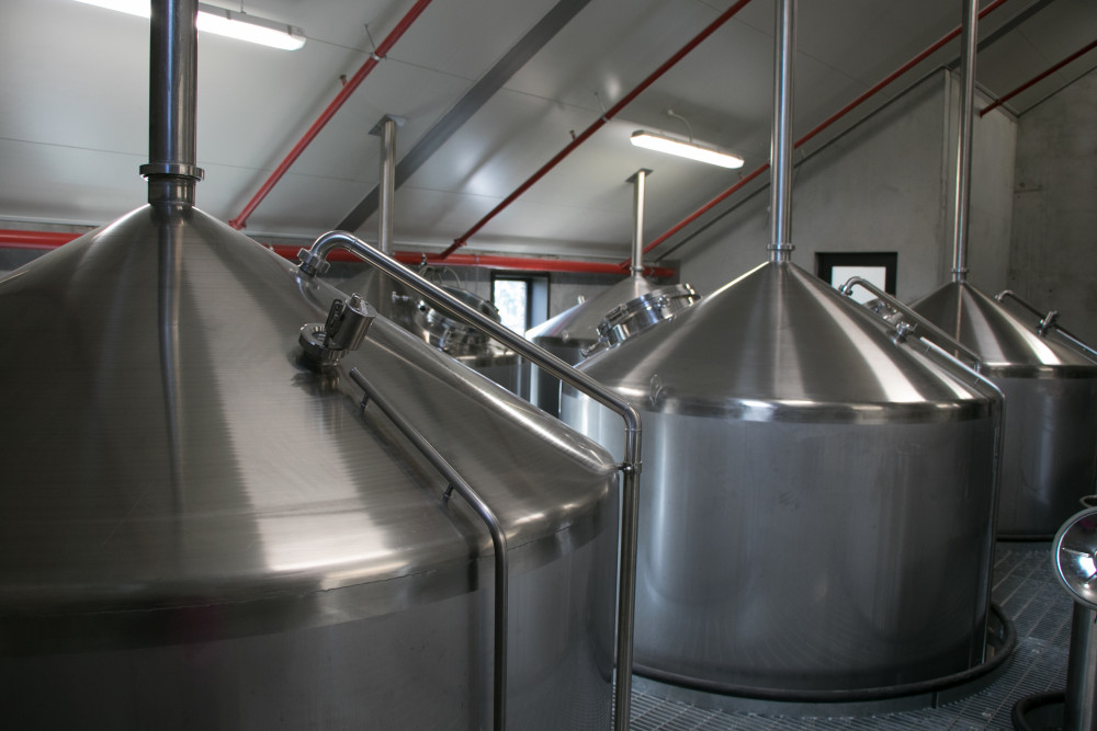 Top of multiple stainless tanks at Cardrona Distillery v2